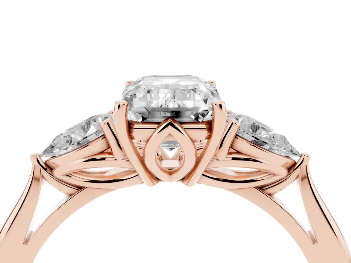 Three-Stone Emerald Cut Brilliant Diamond Solitaire Ring with Tapered Band and Four-Prong Setting Rose gold