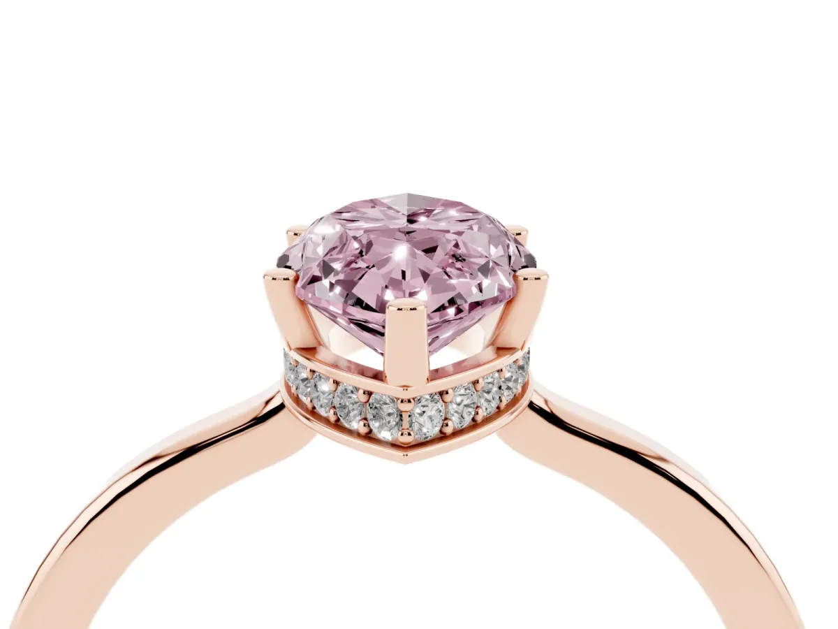 Fancy Pink Marquise Cut Cut Solitaire Engagement Ring with Four-Prong Setting on a Classic Band Rose gold