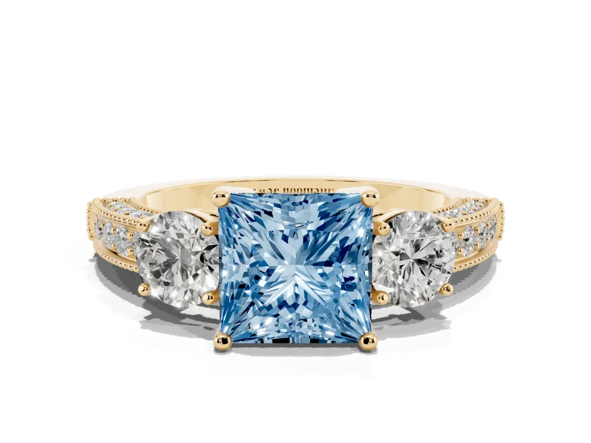 Fancy Blue Princess Cut Three-Stone Diamond Ring with Pavé Band and Four-Prong Setting Yellow gold