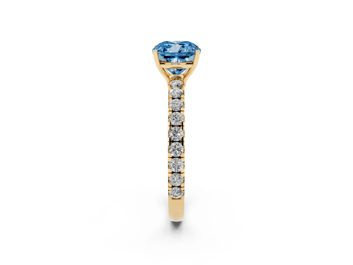 Fancy Blue Cushion Cut Diamond Pavé Solitaire Engagement Ring with Four-Prong Setting Yellow gold