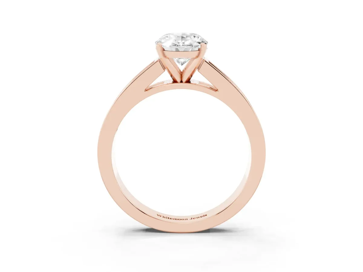 Oval Cut Solitaire Diamond Ring with Channel-Set Band and Four-Prong Setting Rose gold