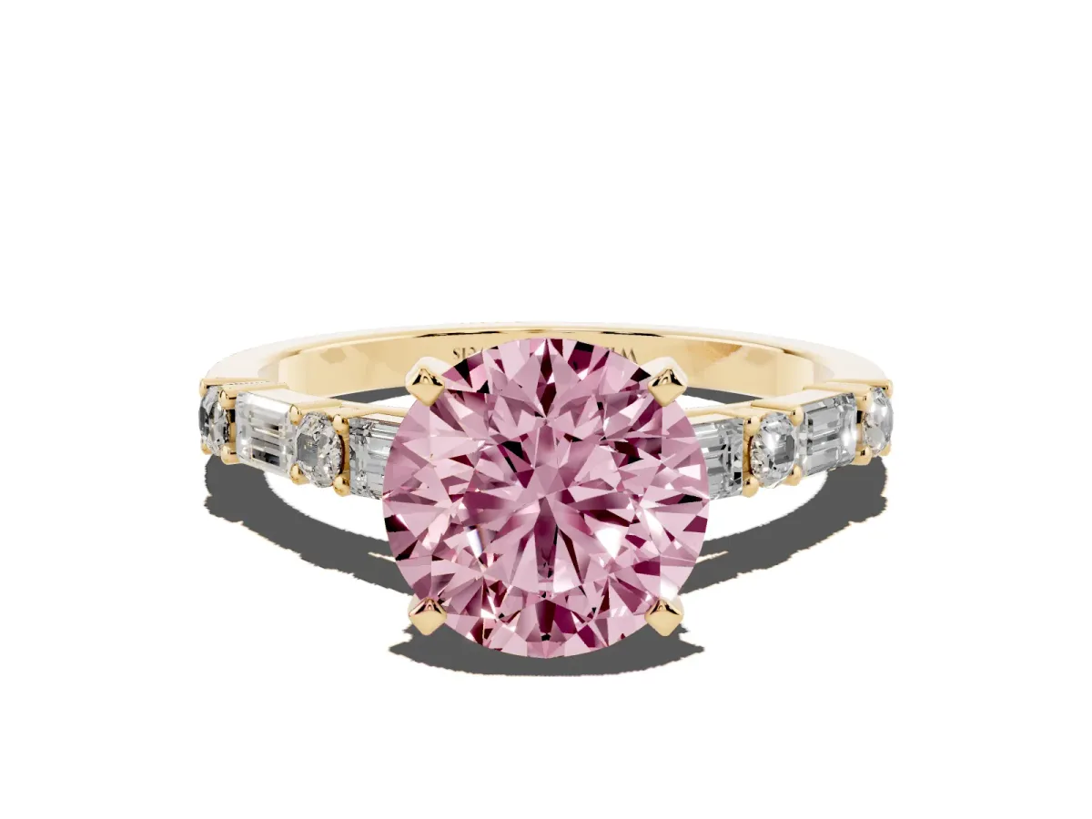 Fancy Pink Round Cut Diamond Solitaire with Side Baguettes and Channel Set Band Yellow gold