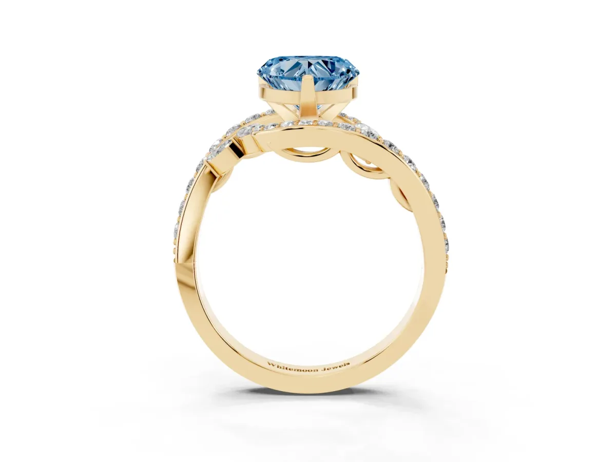 Fancy Blue Heart Cut Solitaire with Pavé Twist Band and Four-Prong Setting Yellow gold