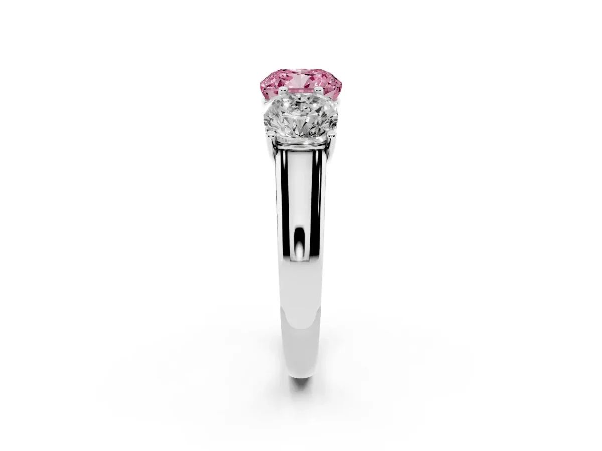 Fancy Pink Cushion Cut Three-Stone Diamond Ring with Prong Setting on a Classic Band Platinum