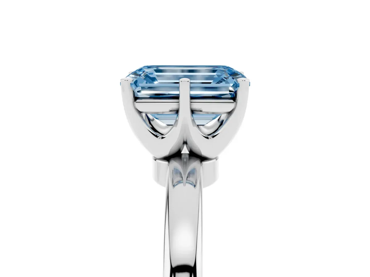 Fancy Blue Emerald Cut Solitaire Diamond Ring with Six-Prong Setting on a Classic Band Platinum