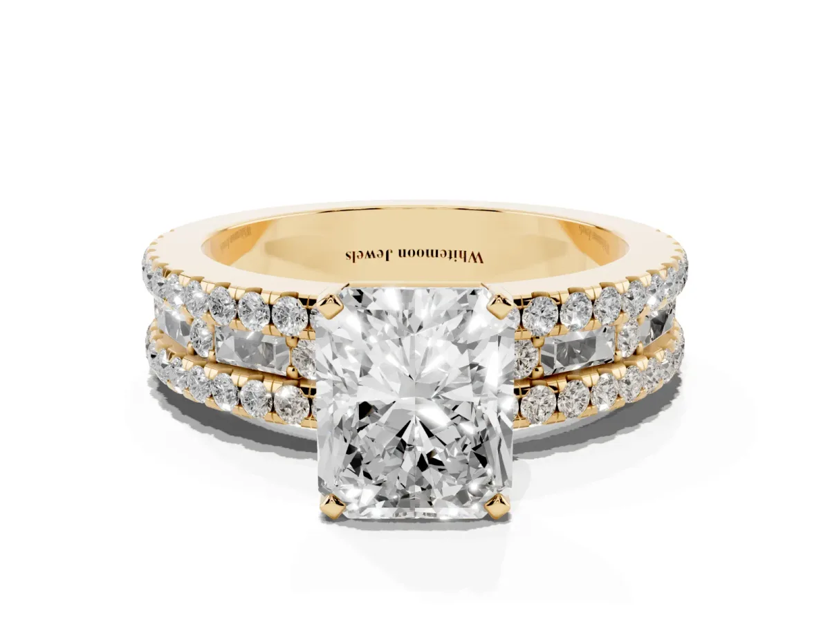 Radiant Cut Diamond Solitaire Ring with Pavé and Channel Set Band Yellow gold