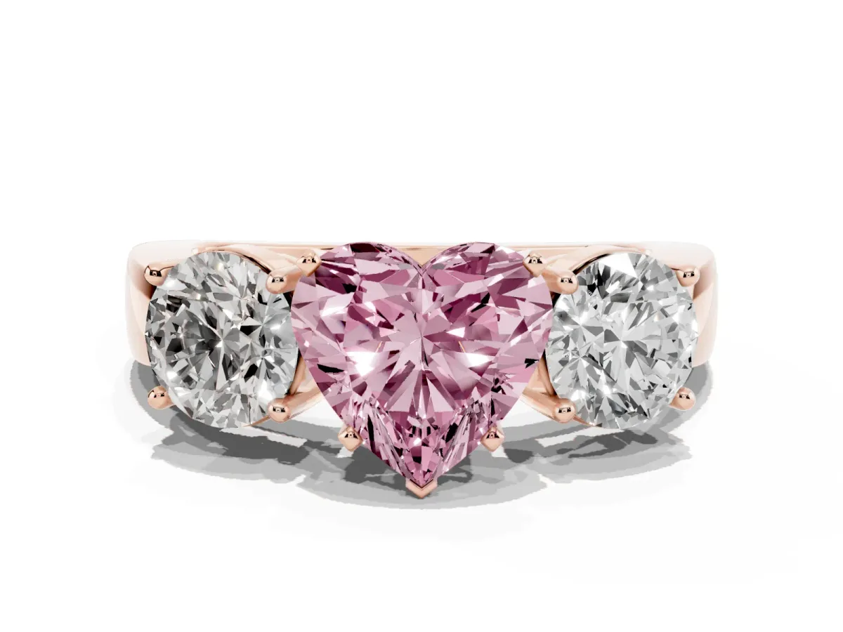 Fancy Pink Three-Stone Heart Cut Diamond Ring with Round Side Stones, Classic Band, and Four-Prong Setting Rose gold