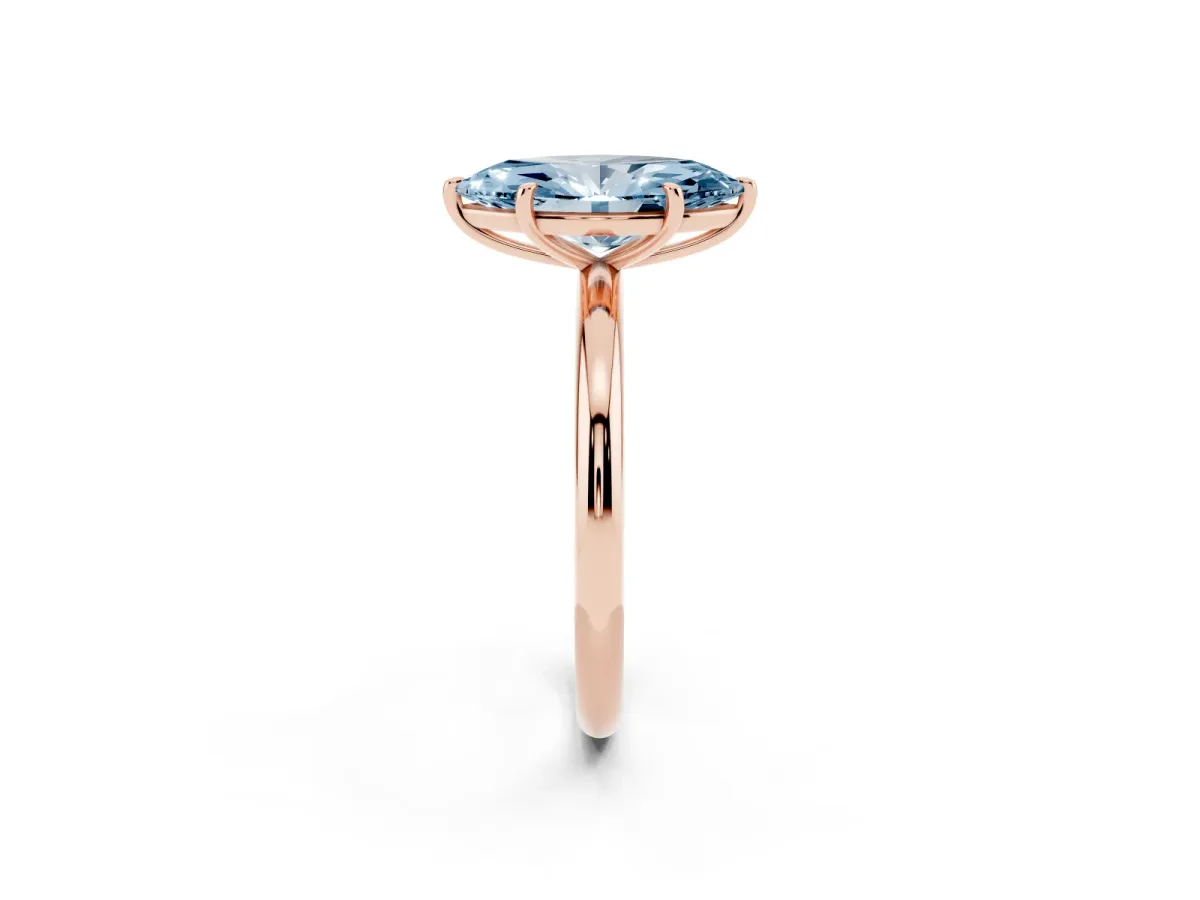 Fancy Blue Oval Cut Solitaire Diamond Ring with Four-Prong Setting on a Plain Band Rose gold