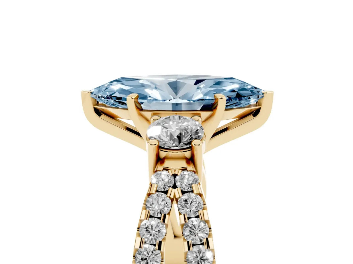 Fancy Blue Marquise Cut Diamond Three-Stone Ring with Pavé Split Shank and Four-Prong Setting Yellow gold