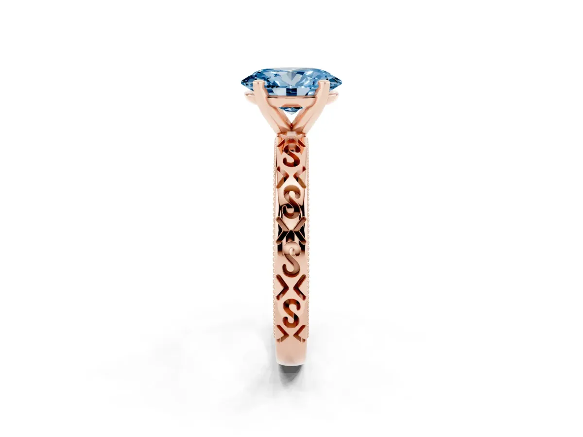 Fancy Blue Oval Cut Solitaire Engagement Ring with Scrollwork Band and Four-Prong Setting Rose gold