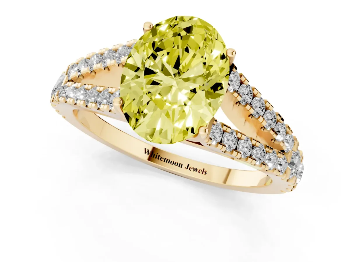 Fancy Yellow Oval Cut Diamond Split Shank Engagement Ring with Round Pavé and Prong Setting Yellow gold