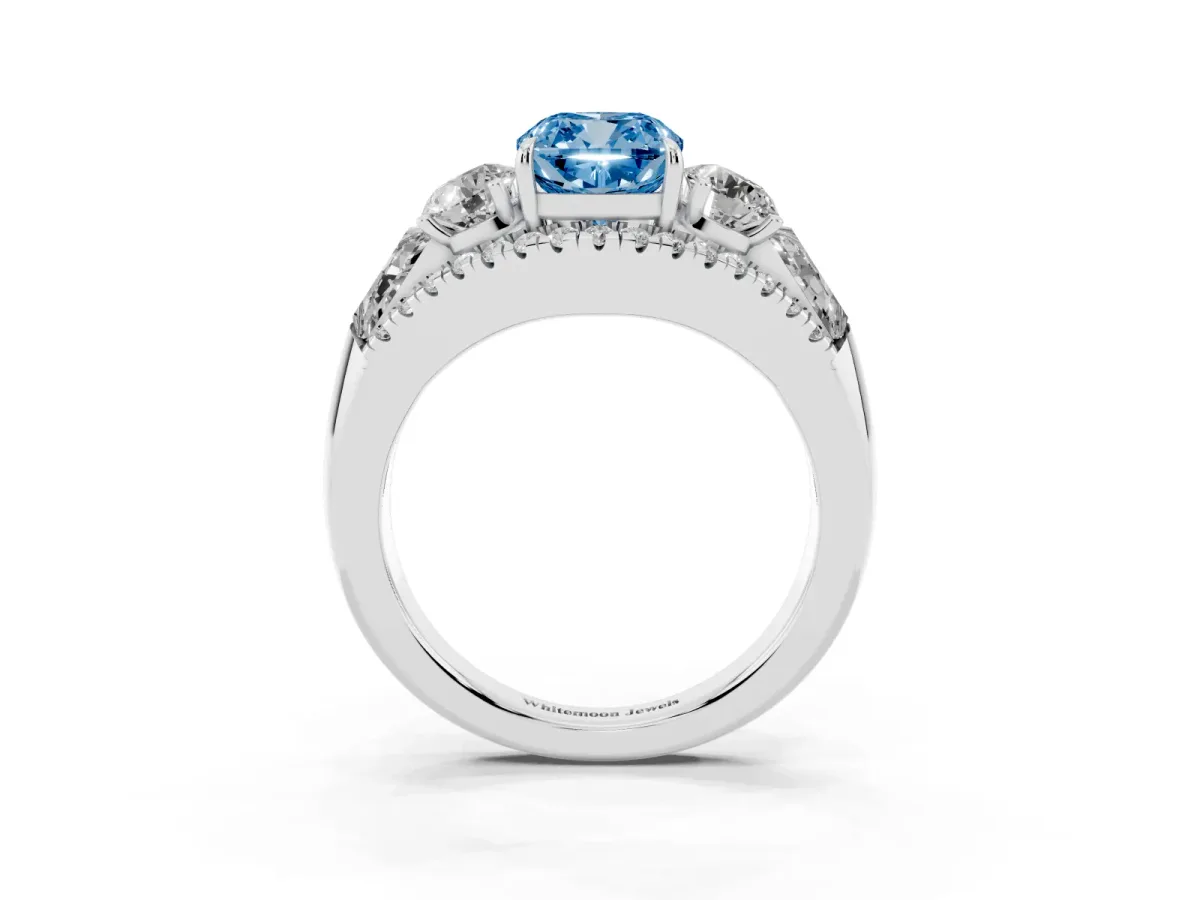 Fancy Blue Three-Stone Cushion Cut Diamond Engagement Ring with Pave Band and Prong Setting Platinum