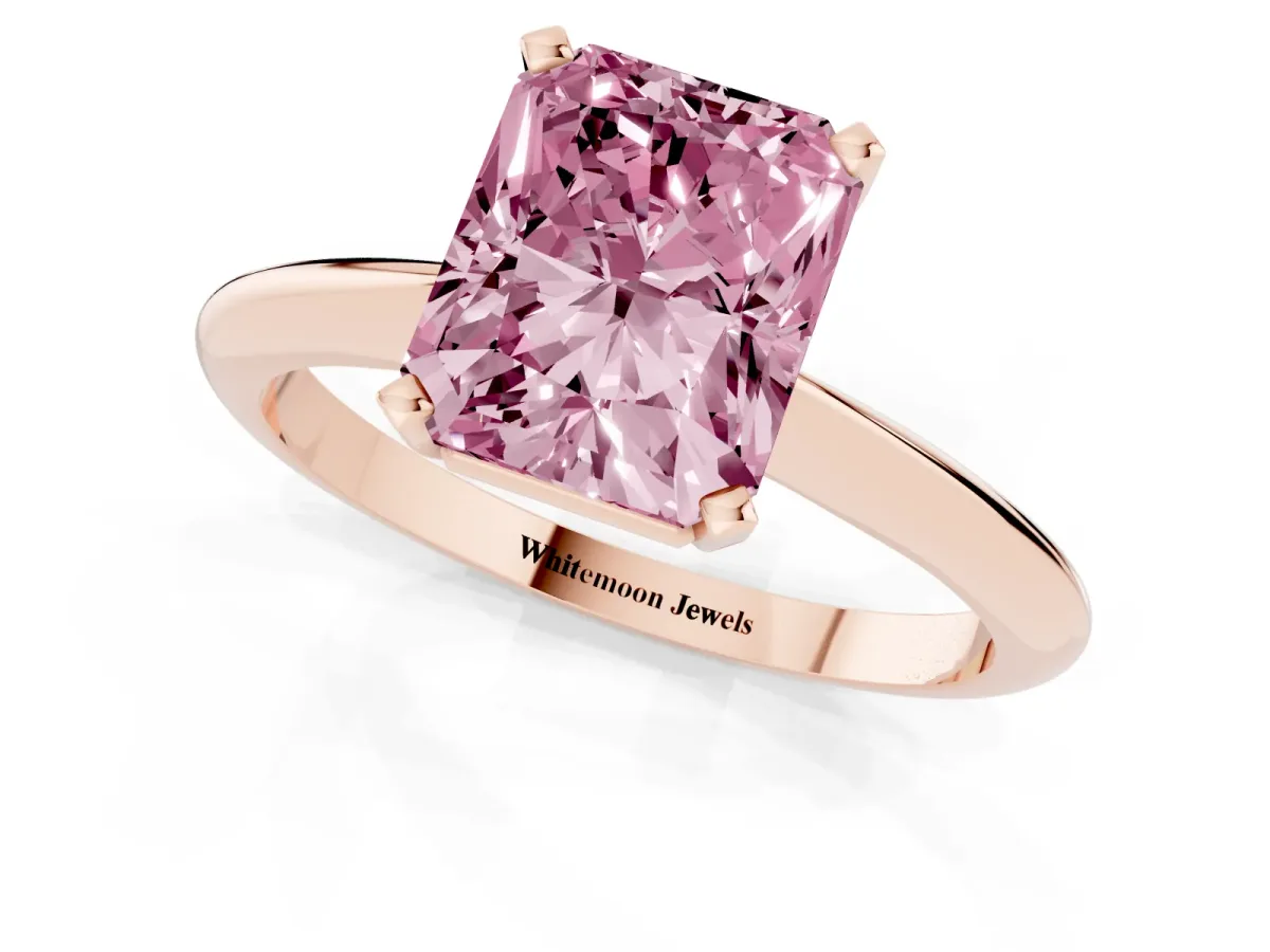 Fancy Pink Radiant Cut Cut Solitaire Ring with Four-Prong Setting on a Classic Band Rose gold