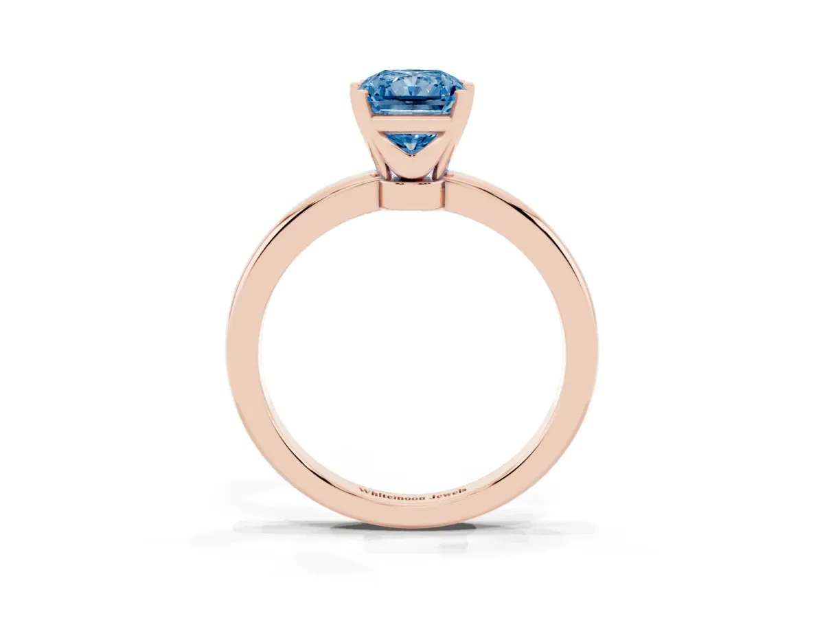 Fancy Blue Radiant Cut Solitaire Diamond Ring with Six-Prong Setting on a Classic Band Rose gold