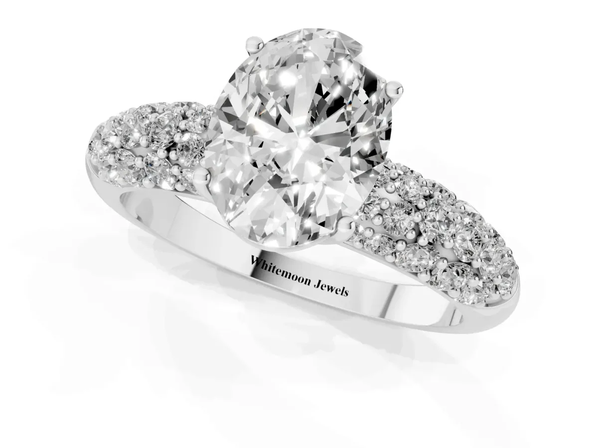 Oval Cut Diamond Pavé Band Solitaire Ring with Four-Prong Setting Silver