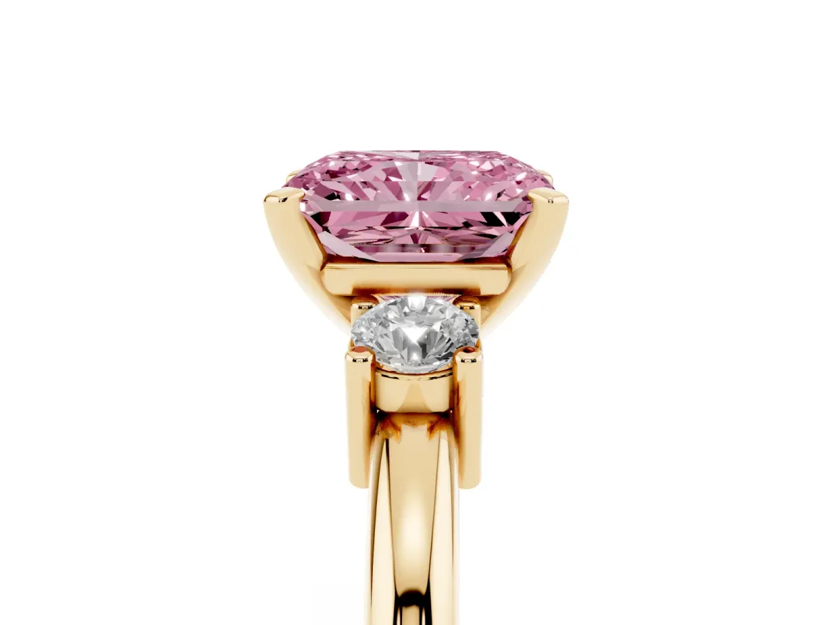 Fancy Pink Three-Stone Radiant Cut Cut Diamond Solitaire with Prong Setting and Classic Band Yellow gold