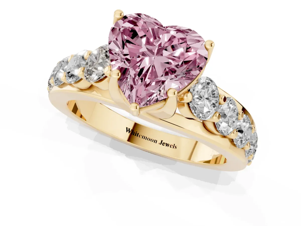 Fancy Pink Heart Cut Diamond Engagement Ring with Pavé Band and Four-Prong Setting Yellow gold