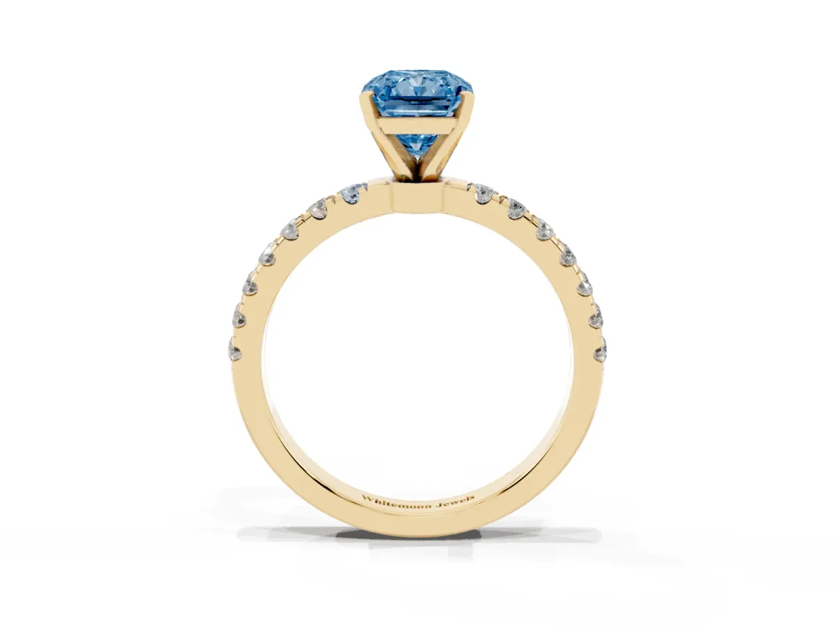 Fancy Blue Radiant Cut Diamond Solitaire Ring with Pavé Accents and Four-Prong Setting Yellow gold