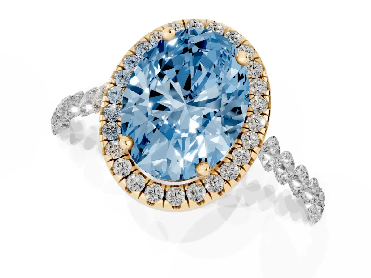Fancy Blue Oval Cut Halo Pavé Diamond Engagement Ring with Four-Prong Setting Yellow gold