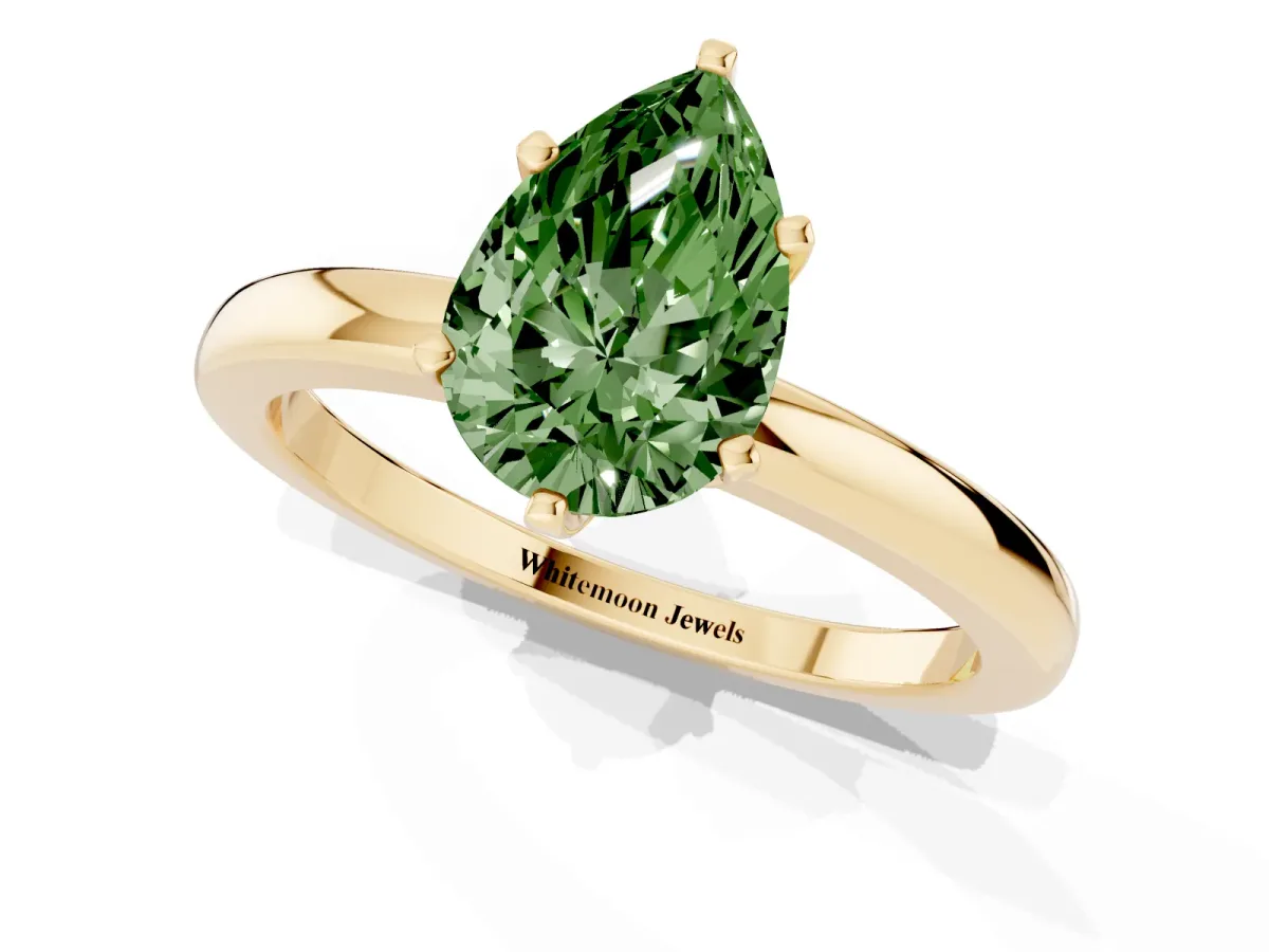 Fancy Green Pear Cut Solitaire Diamond Ring with Six-Prong Setting on a Classic Band Yellow gold
