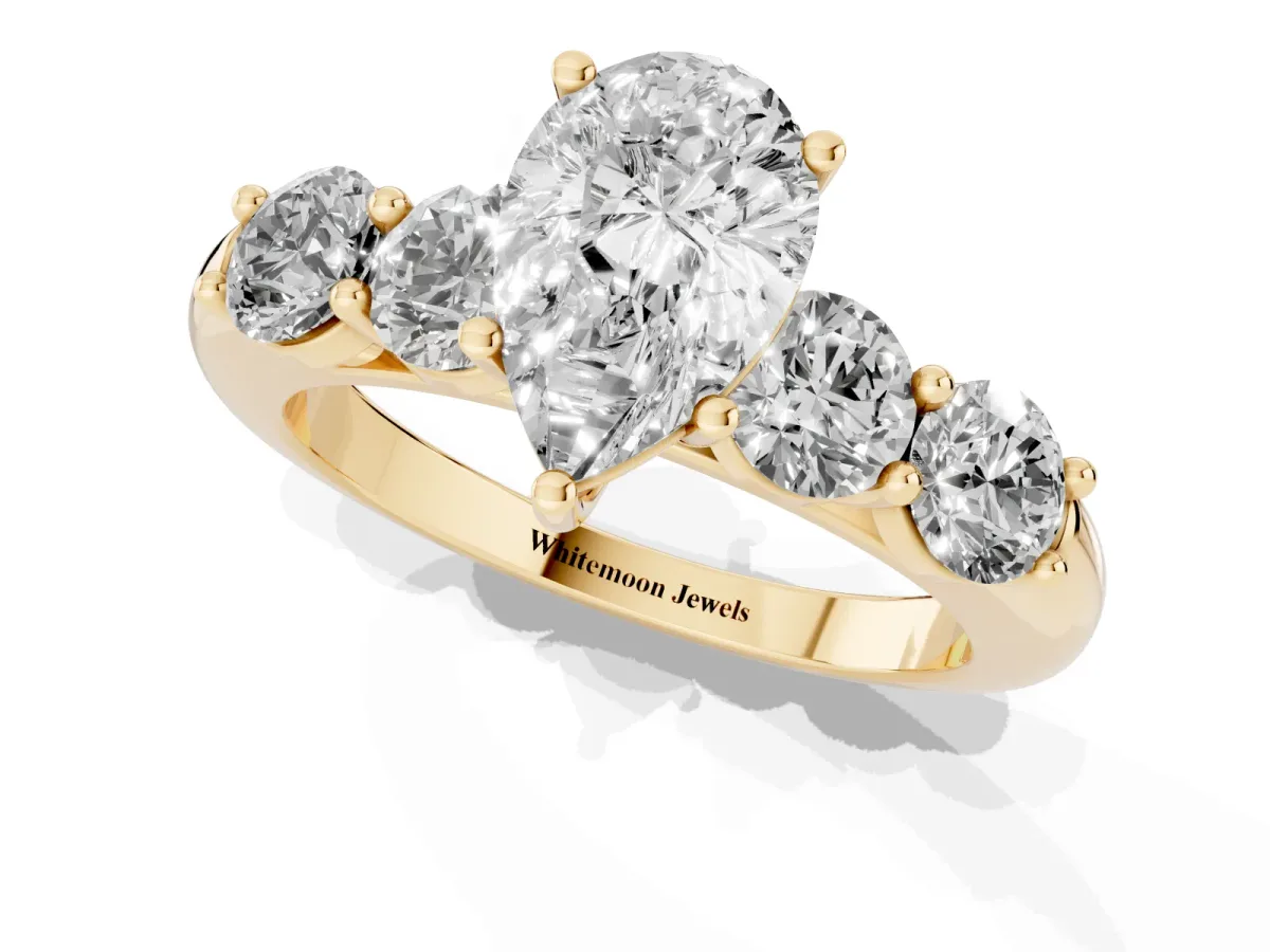 Pear Cut Cut Five-Stone Prong Set Diamond Ring with Classic Band Yellow gold