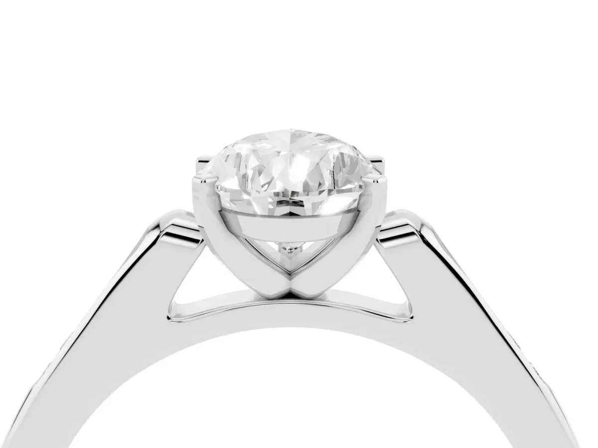 Pear Cut Diamond Solitaire Ring with Channel Set Round Band and Prong Setting Silver