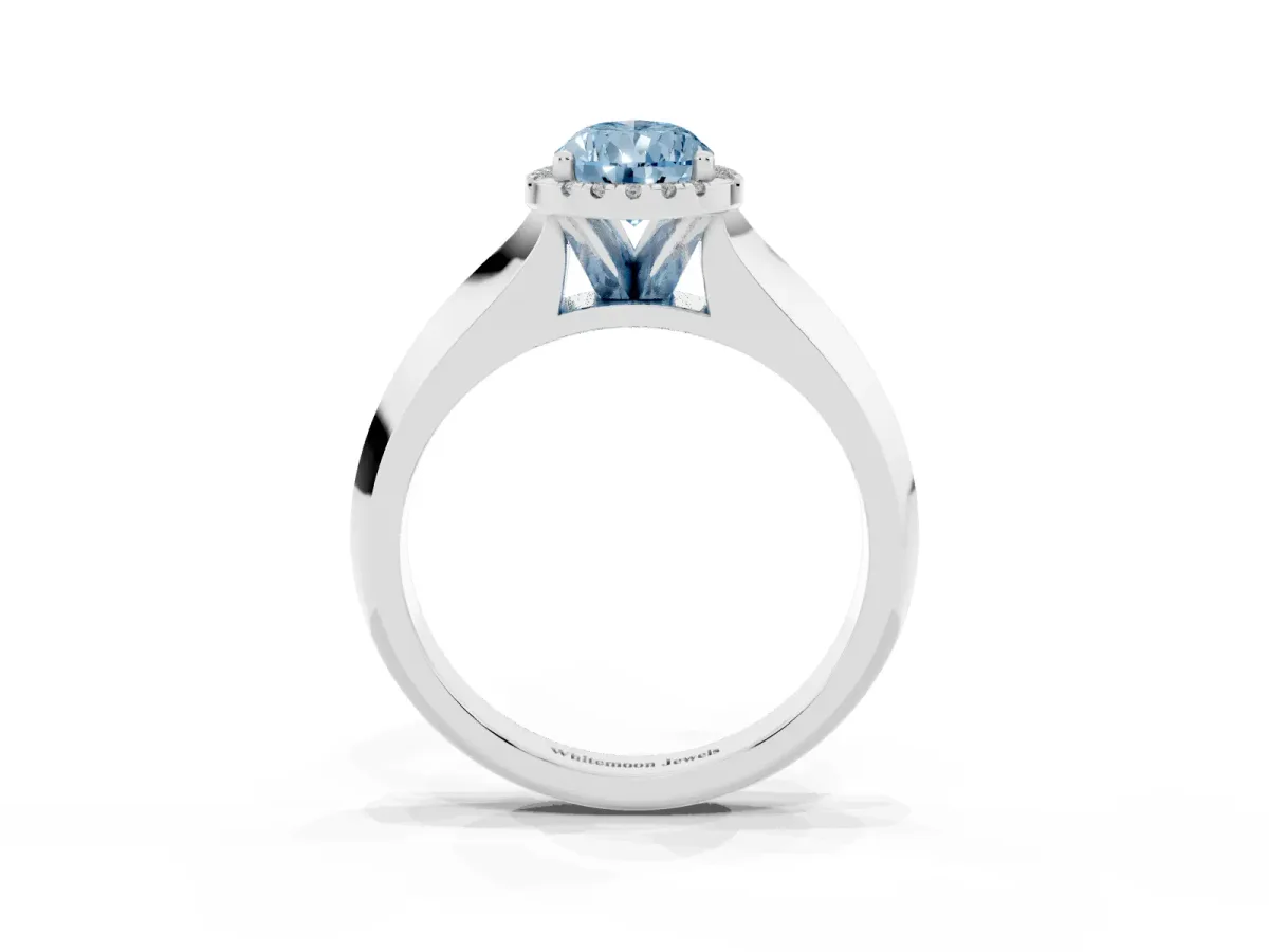 Fancy Blue Pear Cut Halo Diamond Ring with Cathedral Band and Four-Prong Setting White gold