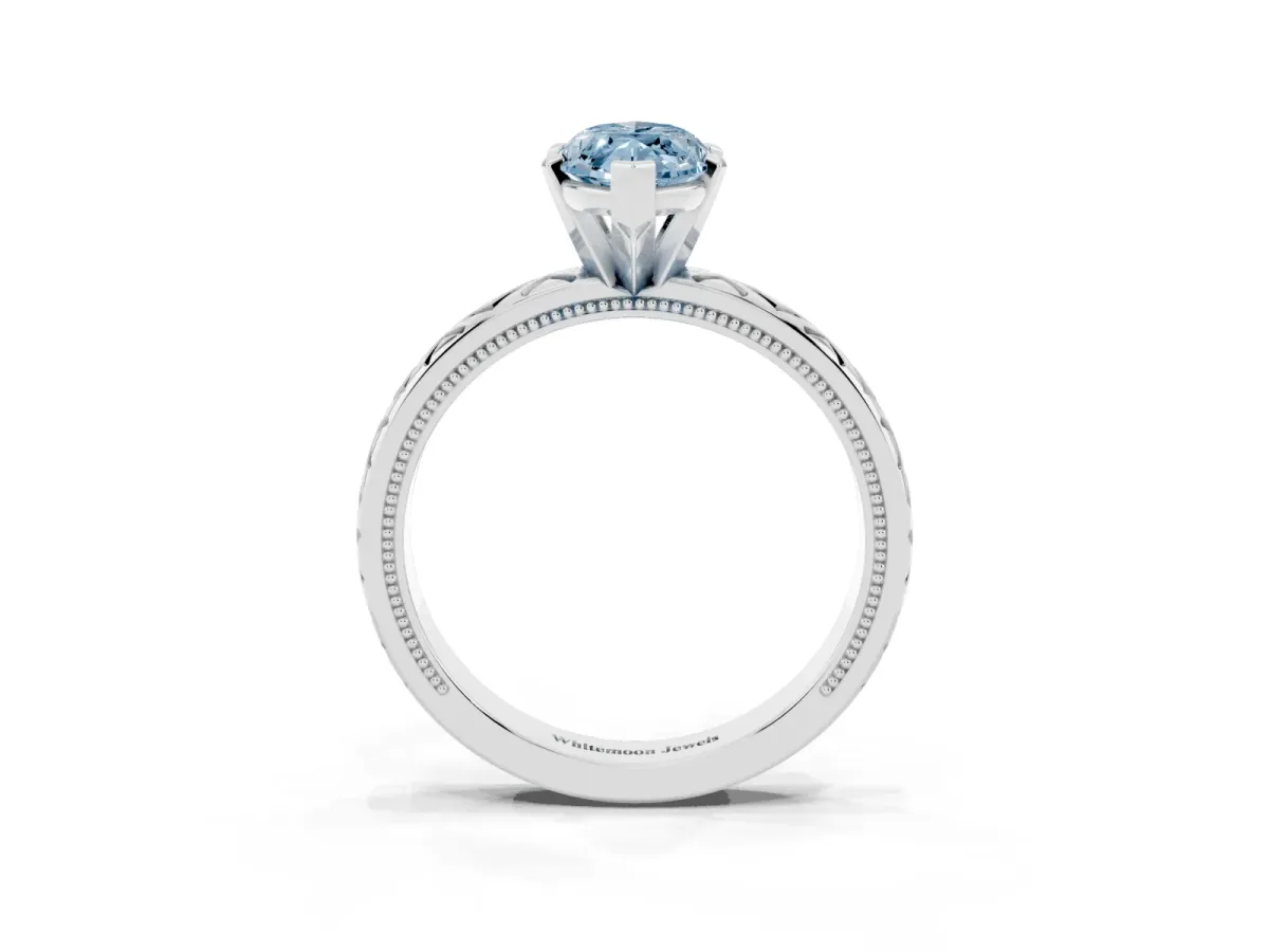 Fancy Blue Marquise Cut Solitaire Diamond Ring with Milgrain and Black Enamel X Pattern Band Platinum