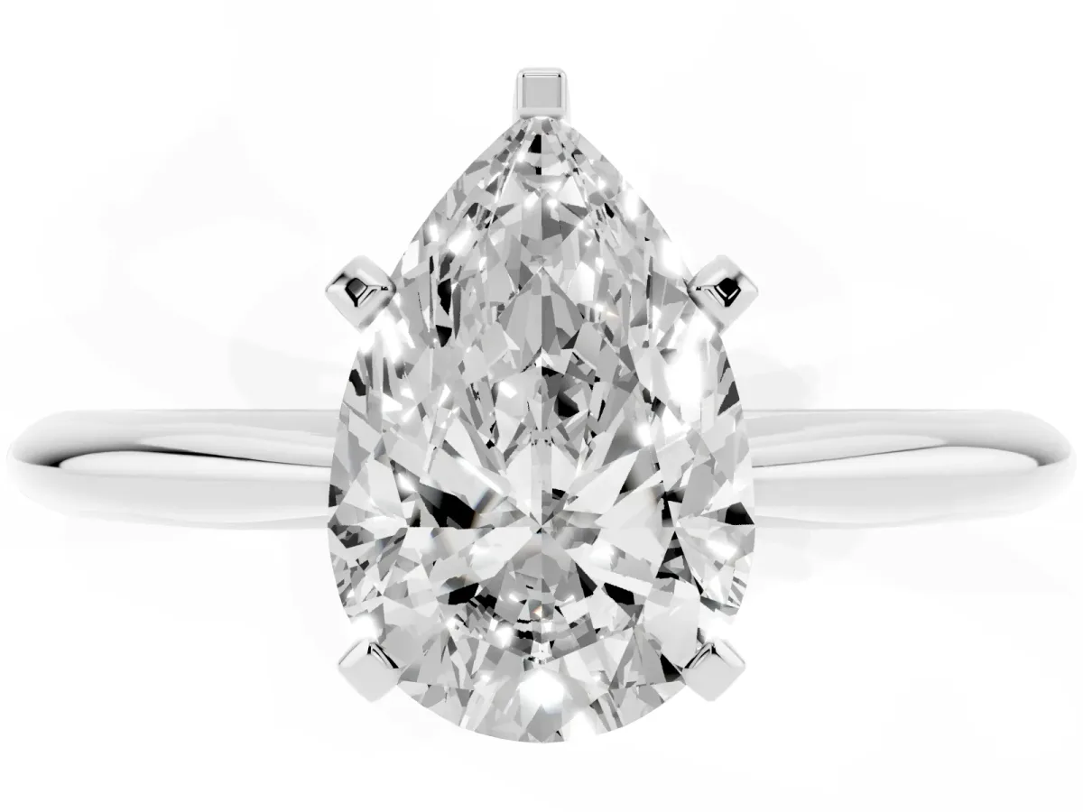 Pear Cut Cut Solitaire Ring with Four-Prong Setting on a Classic Band Silver