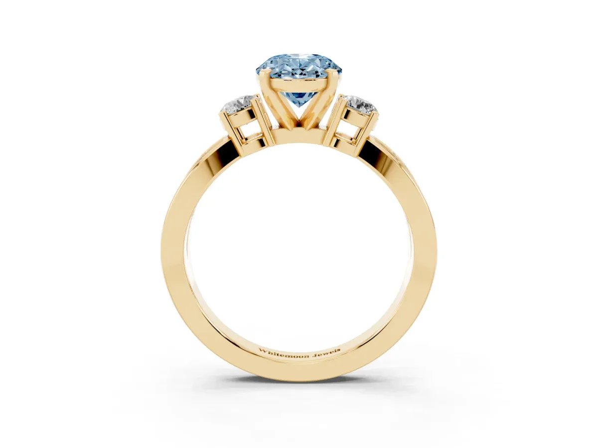 Fancy Blue Three-Stone Oval Cut Cut Diamond Twist Band with Prong Setting Yellow gold