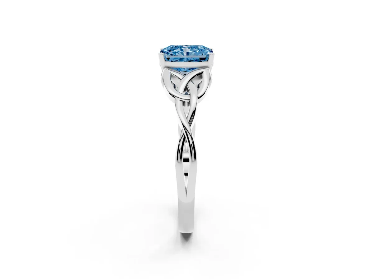 Fancy Blue Radiant Cut Diamond Solitaire Engagement Ring with Celtic Knot Band and Four-Prong Setting White gold