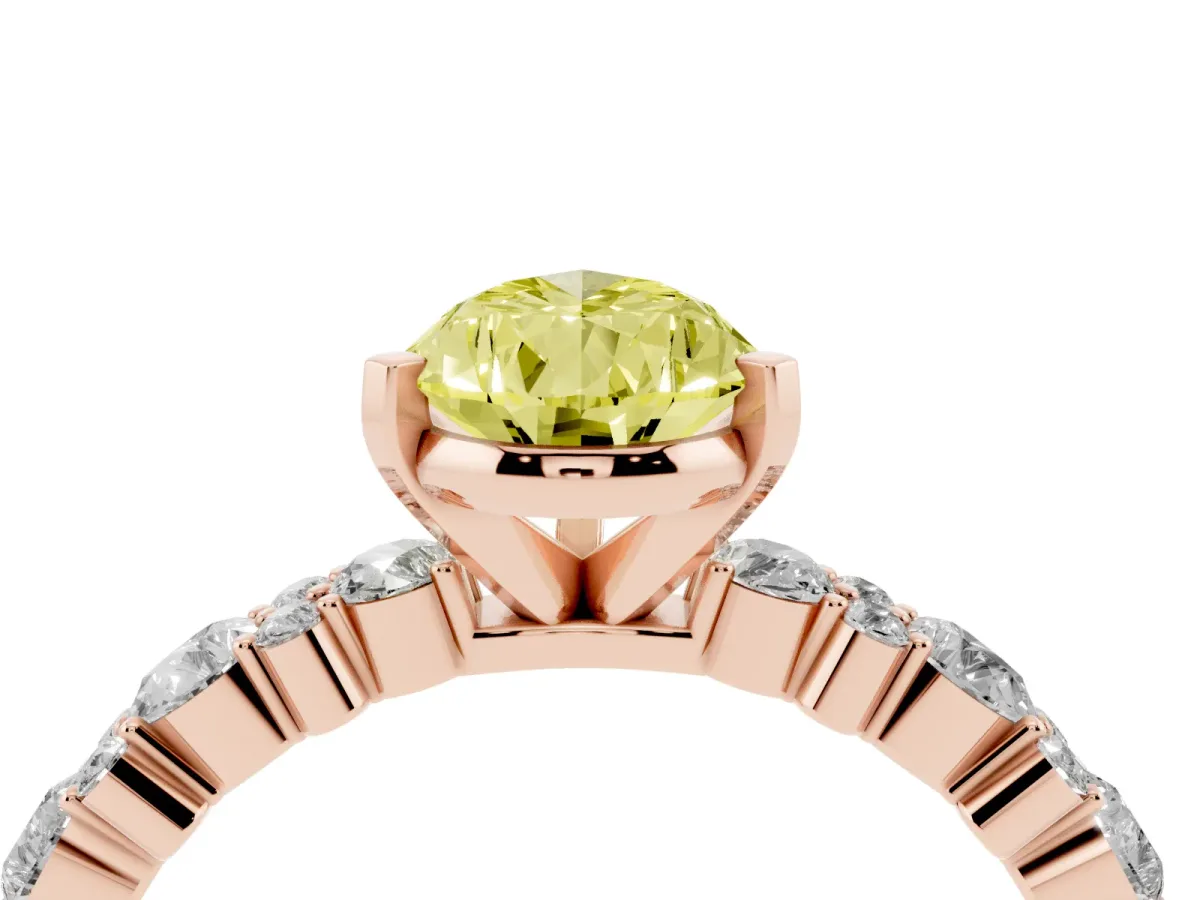 Fancy Yellow Pear Cut Diamond Side Stone Solitaire Ring with Round and Four-Prong Setting Rose gold