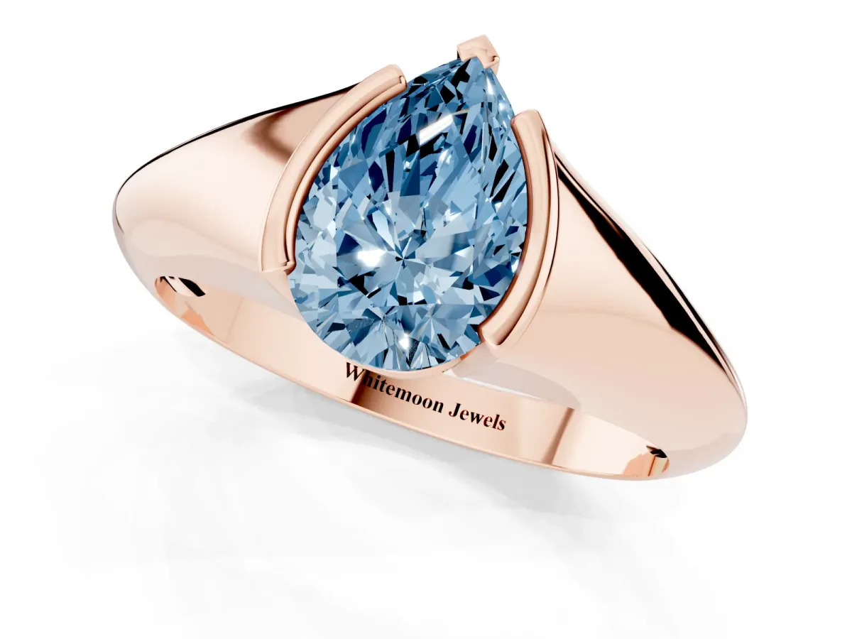 Fancy Blue Pear Cut Solitaire Tension Set Diamond Ring Rose gold