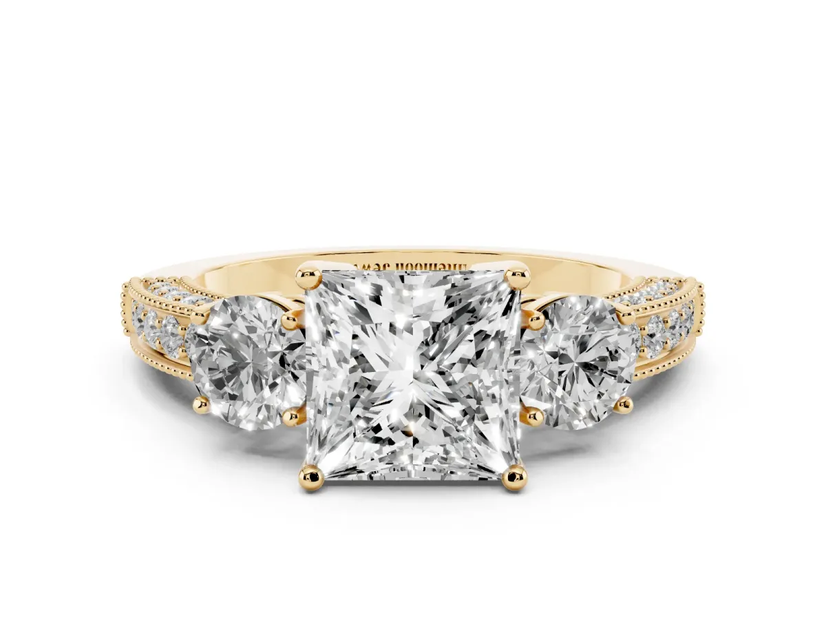 Princess Cut Three-Stone Diamond Ring with Pavé Band and Four-Prong Setting Yellow gold