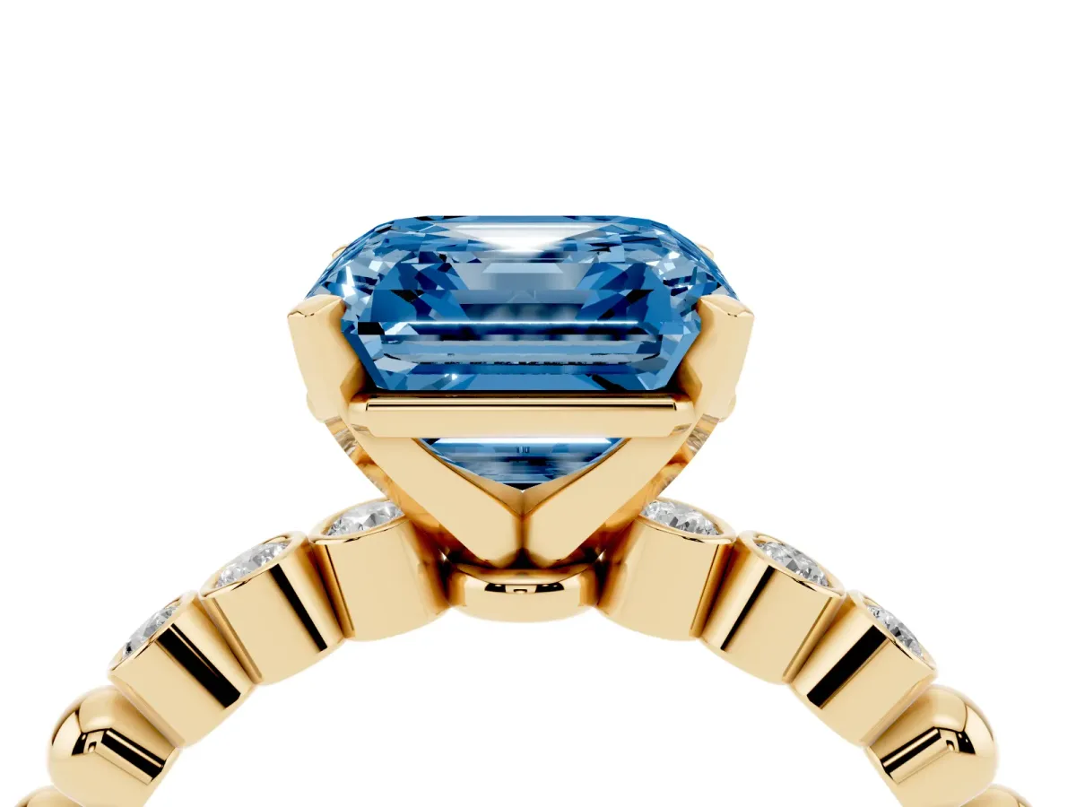 Fancy Blue Asscher Cut Solitaire Bezel Accent Diamond Engagement Ring with Beaded Band and Four-Prong Setting Yellow gold