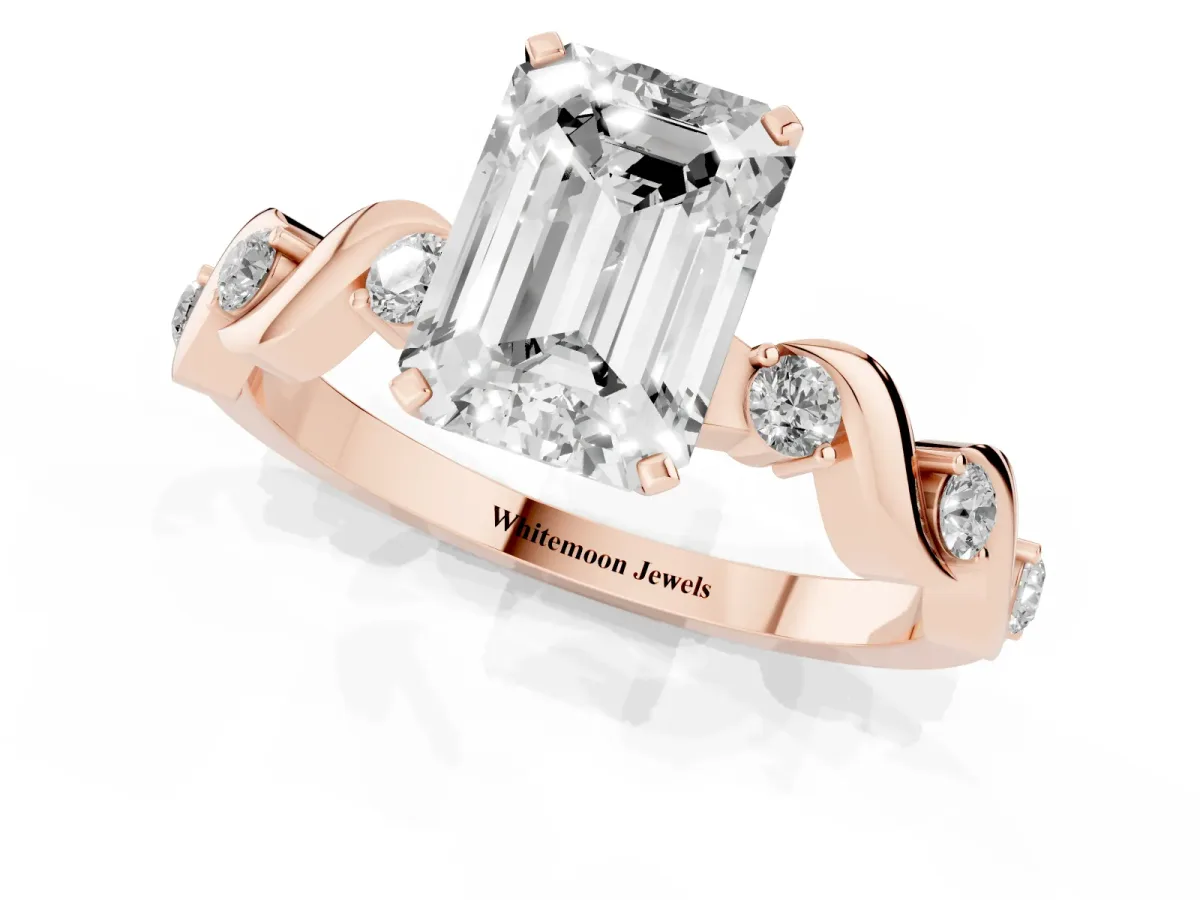 Emerald Cut Diamond Solitaire Twisted Band with Round Accents and Prong Setting Rose gold