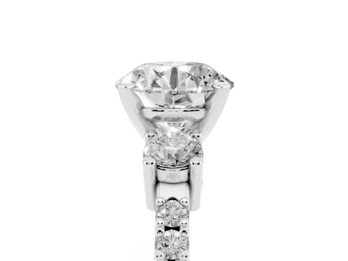 Round Cut Three-Stone Diamond Pavé Band with Prong Setting White gold