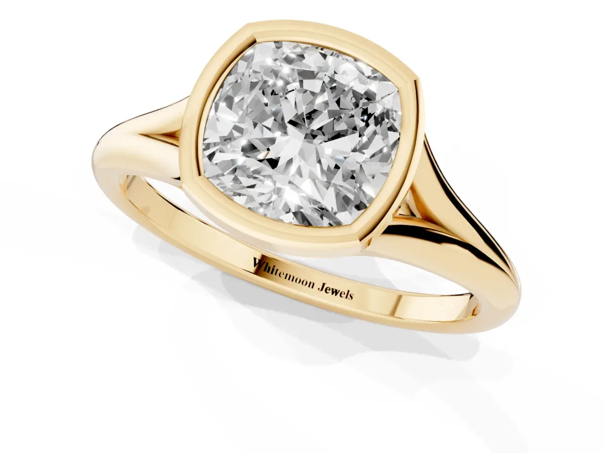Bezel Set Cushion Cut Cut Solitaire Ring with Tapered Band Yellow gold