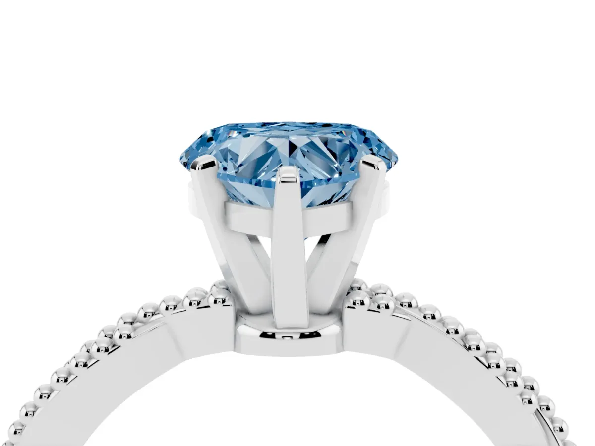Fancy Blue Heart Cut Solitaire Twisted Band with Bead Prong Setting Platinum