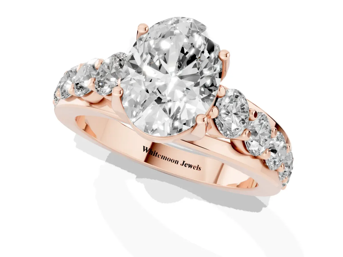 Oval Cut Diamond Engagement Ring with Pavé Band and Four-Prong Setting Rose gold