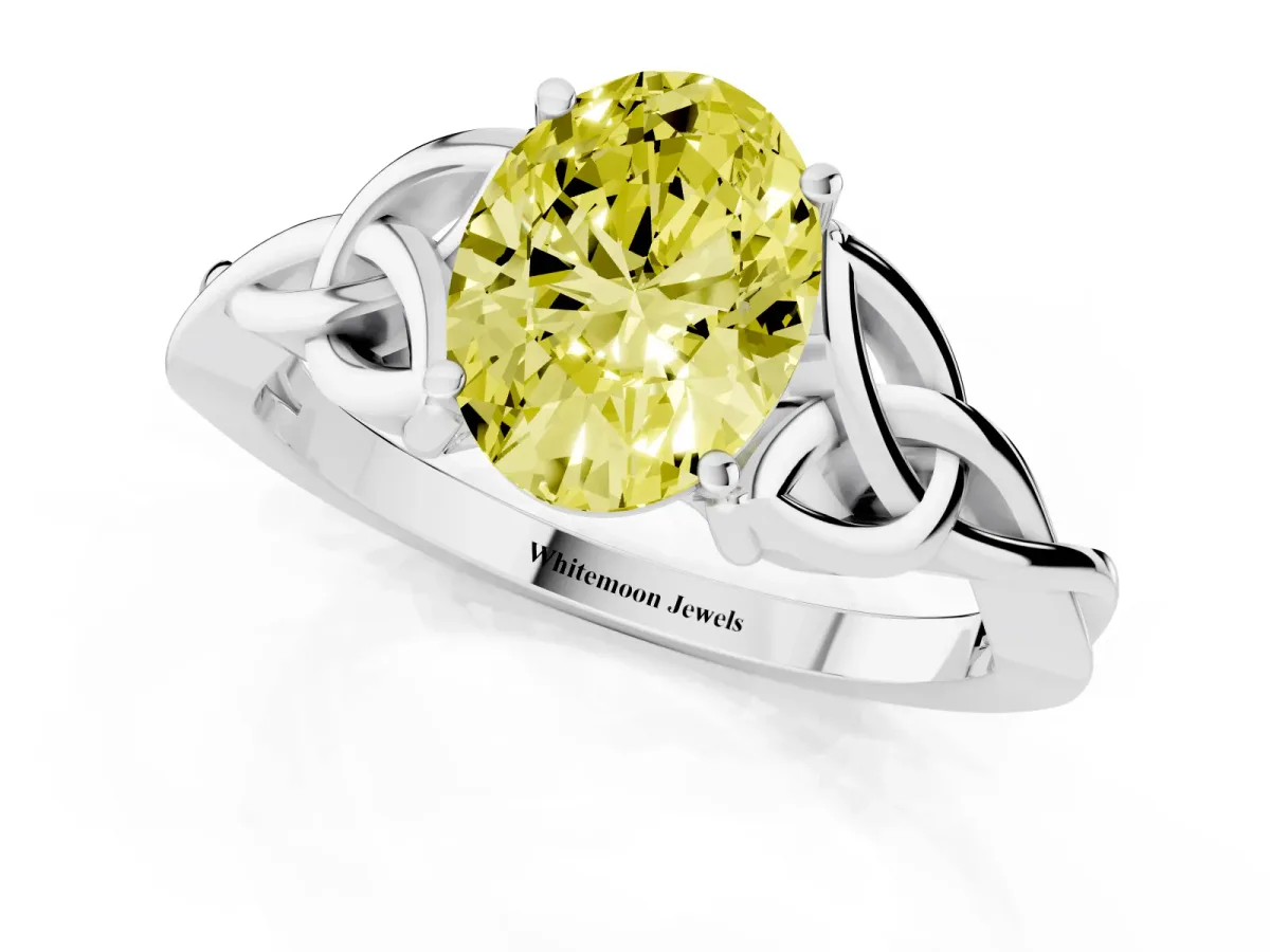 Fancy Yellow Oval Cut Diamond Solitaire Engagement Ring with Celtic Knot Band and Four-Prong Setting White gold