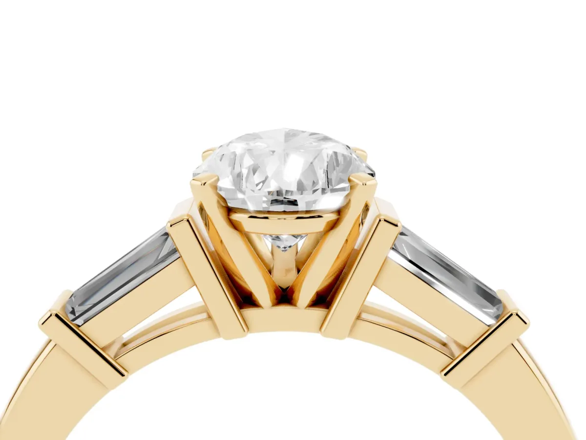 Pear Cut Cut Diamond Solitaire Ring with Tapered Baguette Accents and Four-Prong Setting Yellow gold