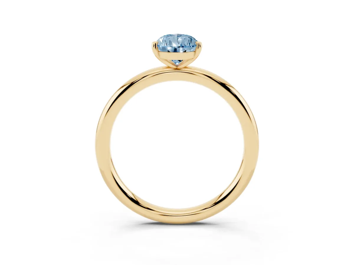 Fancy Blue Pear Cut Solitaire Diamond Ring with Four-Prong Setting on a Plain Band Yellow gold