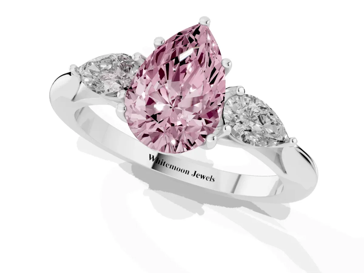 Fancy Pink Three-Stone Pear Cut Diamond Ring with Pear Side Stones in Four-Prong Setting Silver