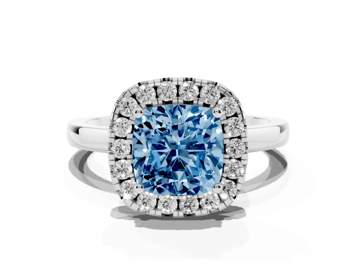 Fancy Blue Cushion Cut Halo Diamond Solitaire with Pavé Band and Four-Prong Setting Silver
