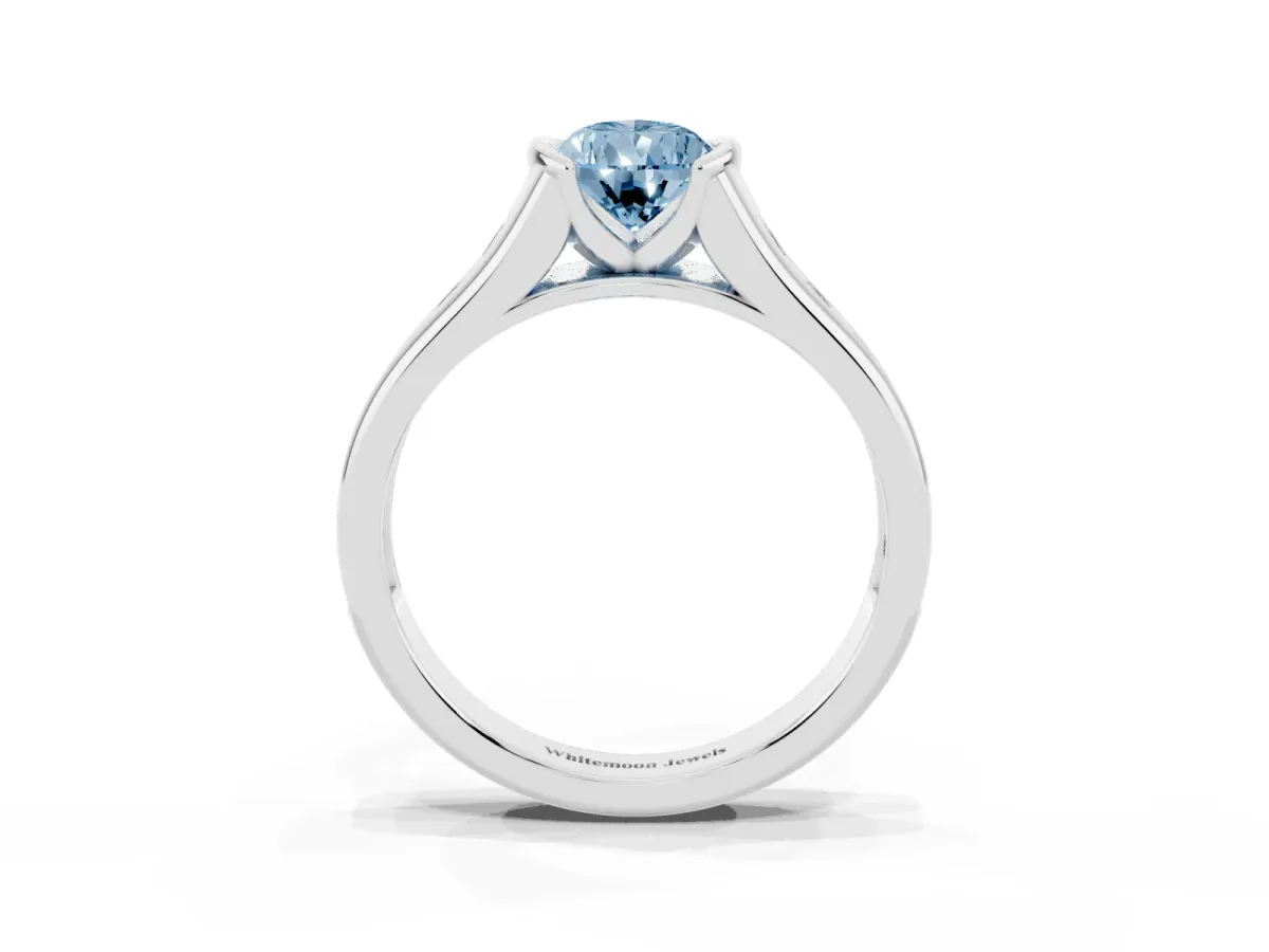 Fancy Blue Pear Cut Solitaire Bezel-Set Diamond Ring with Channel-Set Band Platinum