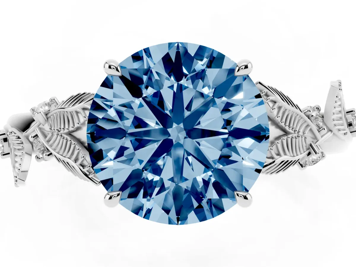 Fancy Blue Round Cut Diamond Solitaire Ring with Leaf Motif Band and Four-Prong Setting Silver
