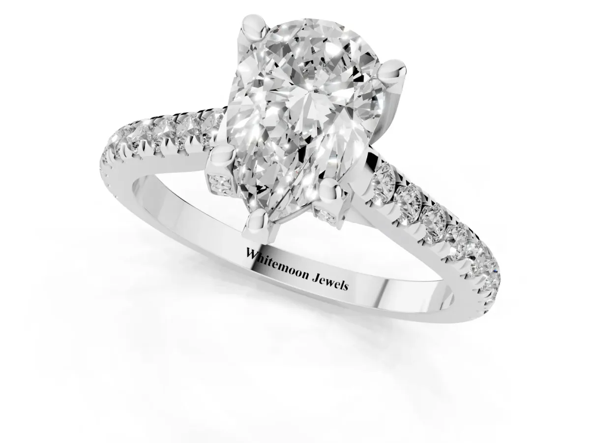 Pear Cut Brilliant Diamond Solitaire with Pavé Band and Four-Prong Setting Platinum