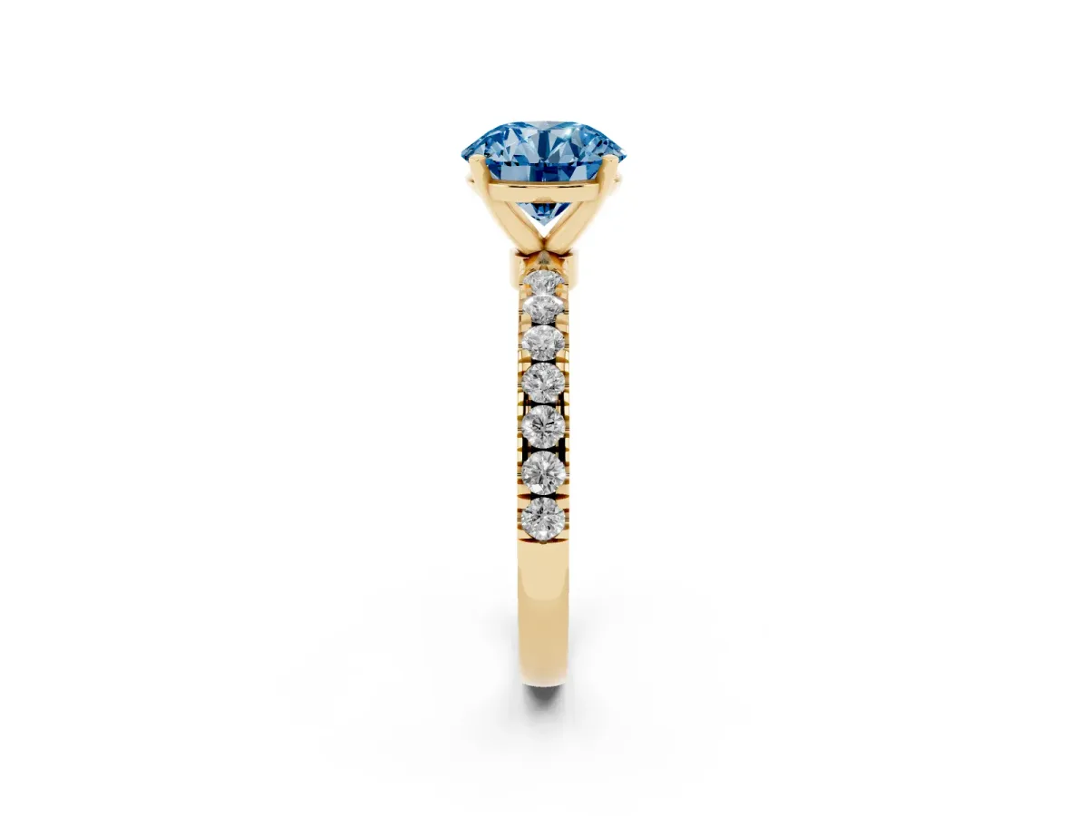 Fancy Blue Round Cut Diamond Solitaire Ring with Pavé Accents and Four-Prong Setting Yellow gold