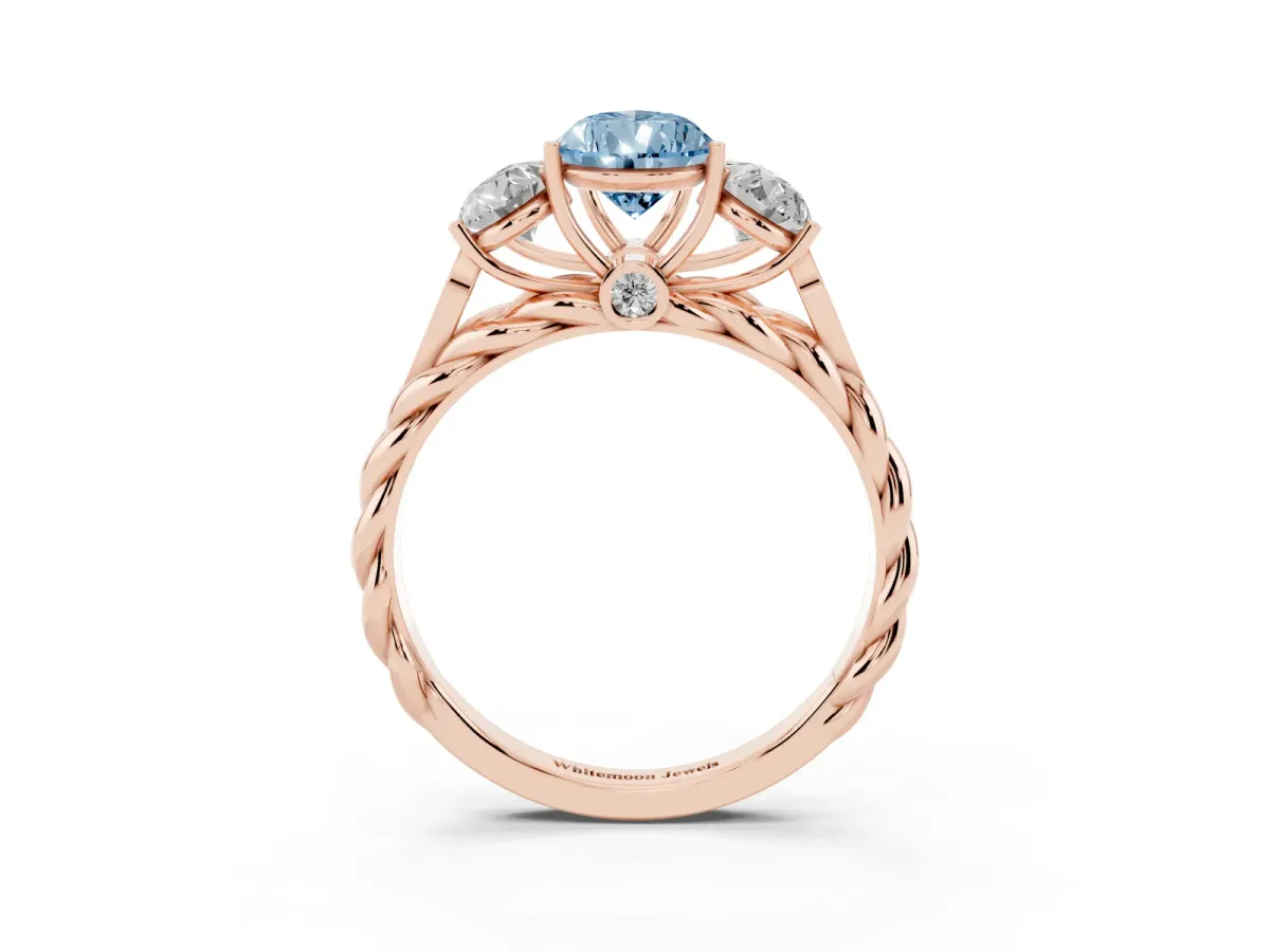 Fancy Blue Three-Stone Pear Cut Diamond Braided Band Ring with Four-Prong Setting Rose gold